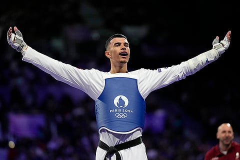 Men's 80kg Taekwondo: Denmark's Edi Hrnic celebrates winning bronze medal
